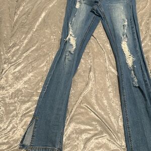 Fashion Nova ripped knee boot cut jeans